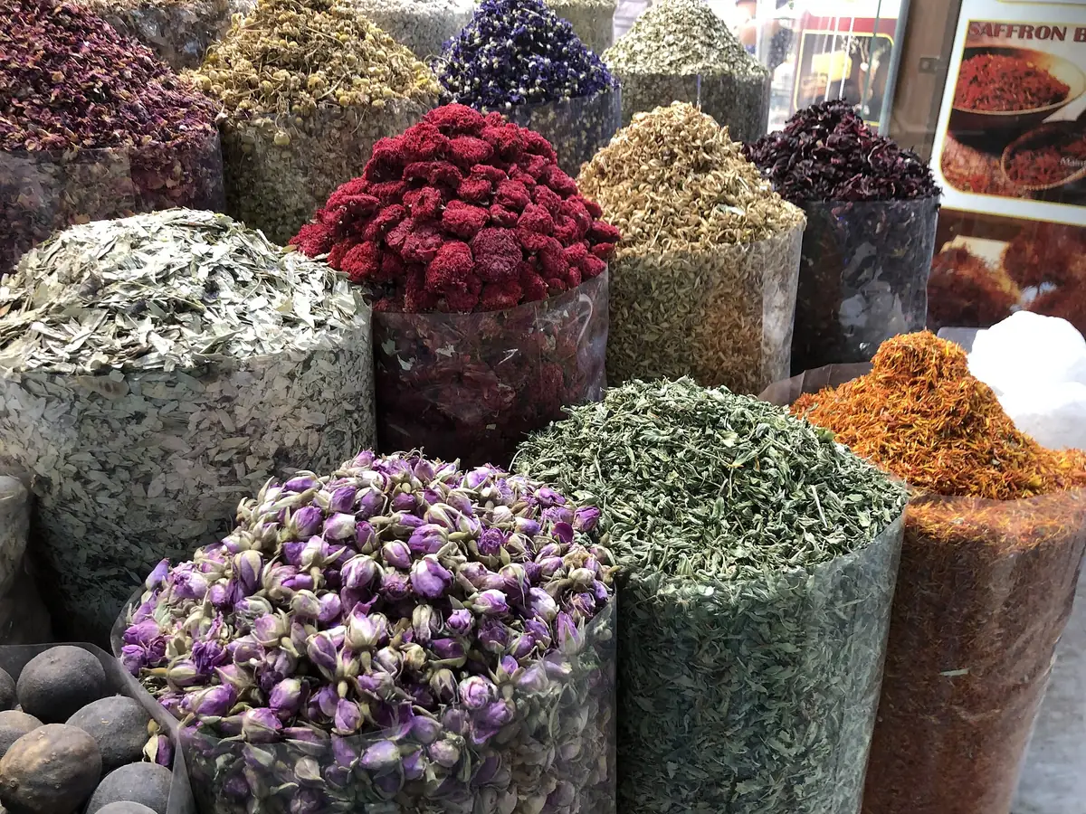 The Best Day in Dubai: A One-Day Itinerary With Every Dirham Counted 9 Open sacks of dried rose buds, herbs and spices in the Spice Souk in Deira, Dubai