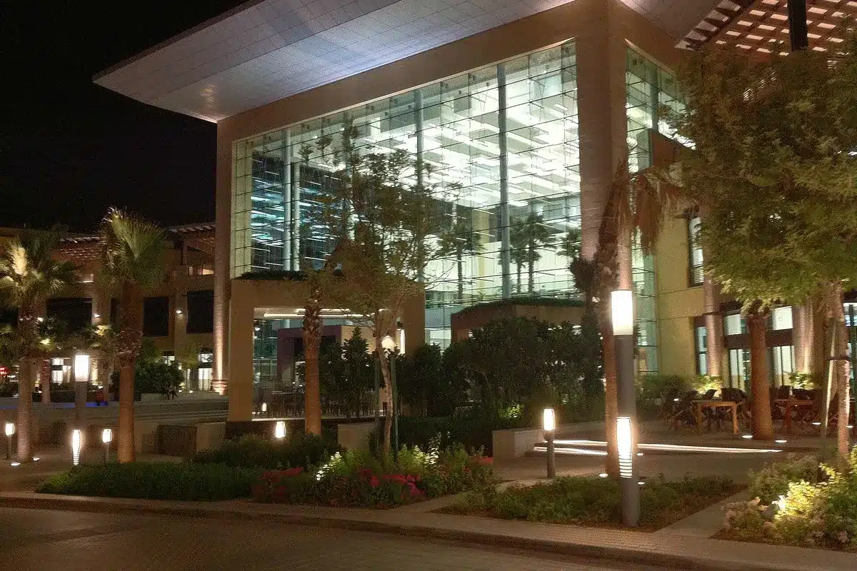 Indoor Activities in Dubai: 30 Places With Real Prices and 4 Ready-Made Days 32 Glass entrance of City Centre Mirdif mall in Dubai at night, where Activate is
