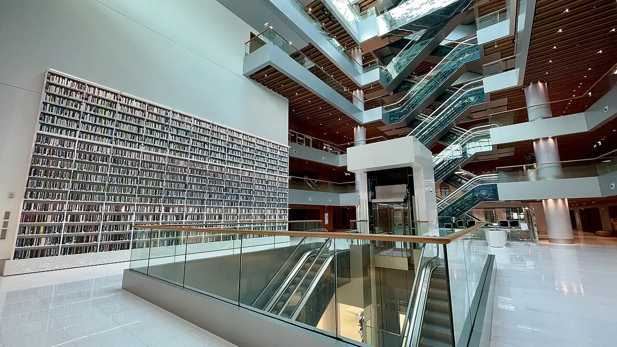 Indoor Activities in Dubai: 30 Places With Real Prices and 4 Ready-Made Days 15 Book wall and atrium inside Mohammed Bin Rashid Library in Al Jaddaf, Dubai